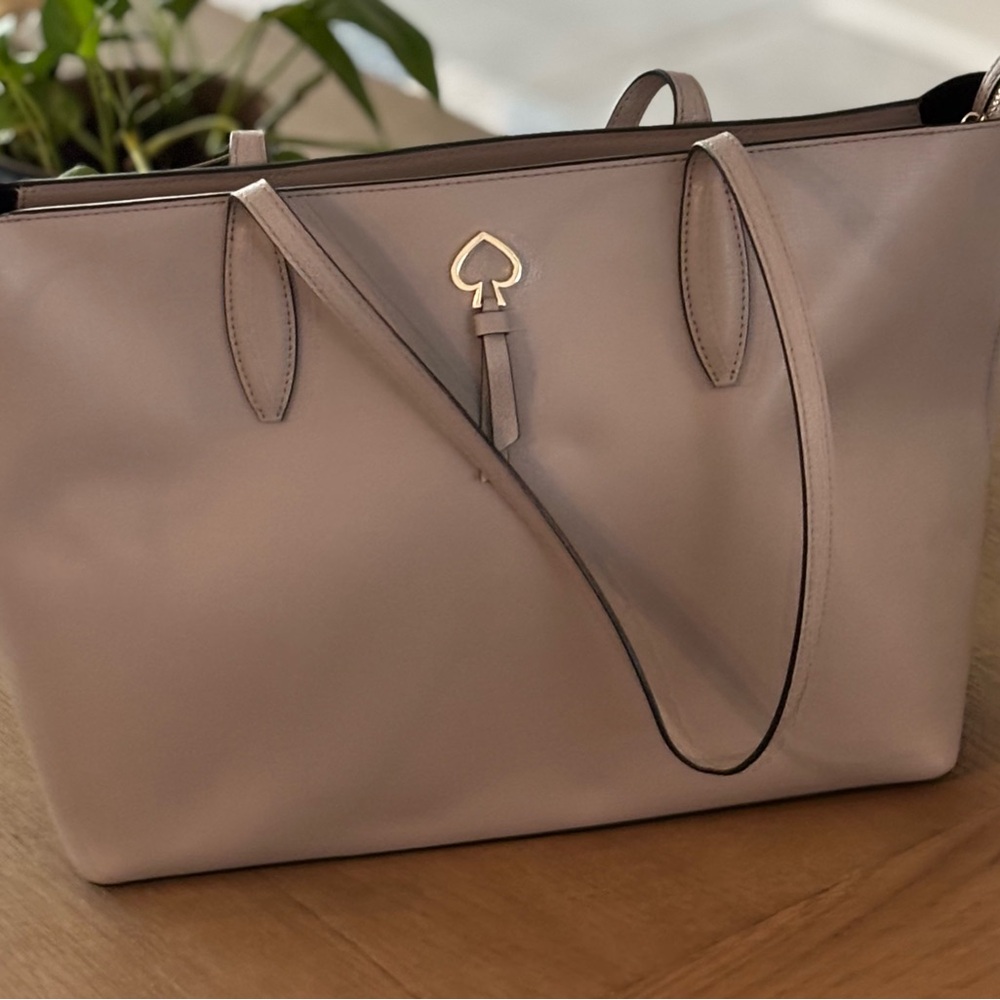Kate Spade Cream Tote with Minimalist Design and Spacious Interior